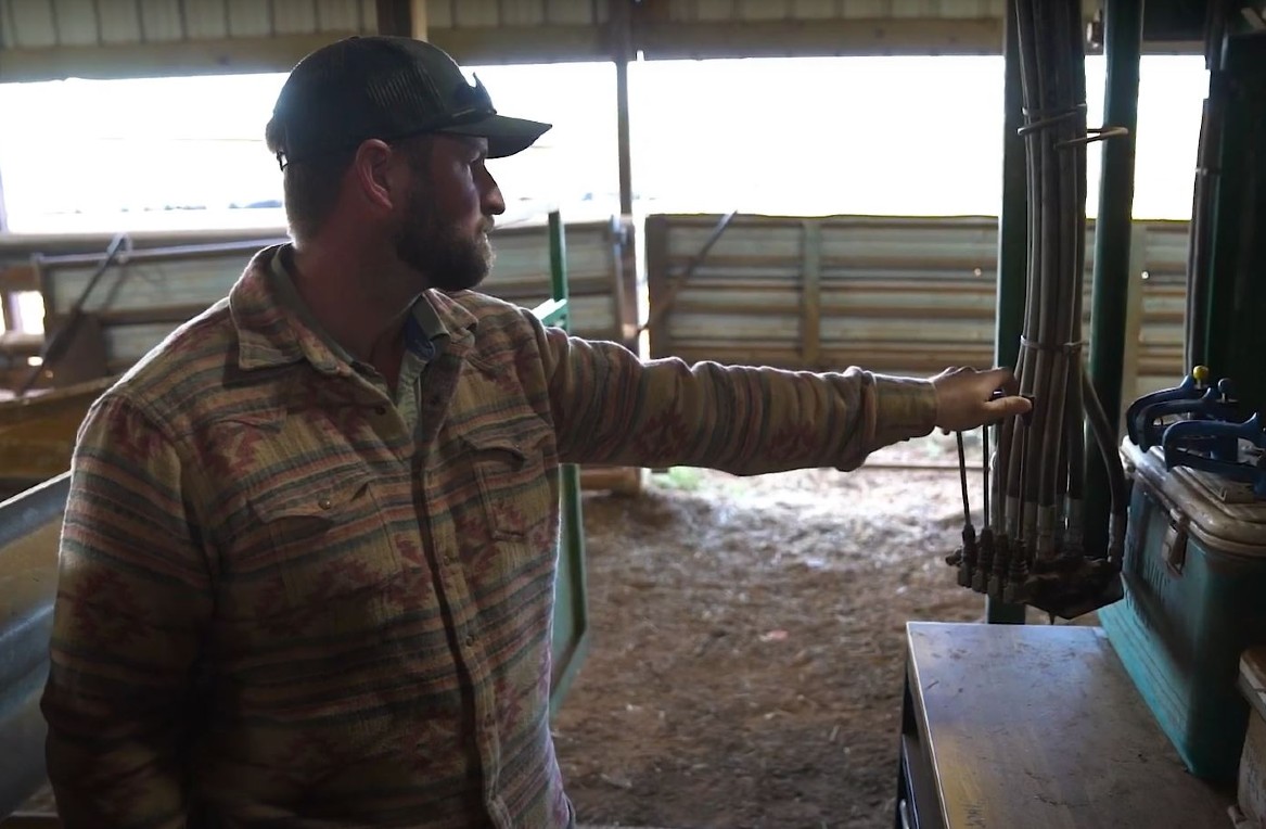 Clay Alexander in barn at Weems Creek Cattle Company